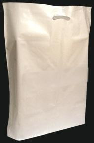 A plain white plastic bag with a die-cut handle, photographed against a black background.