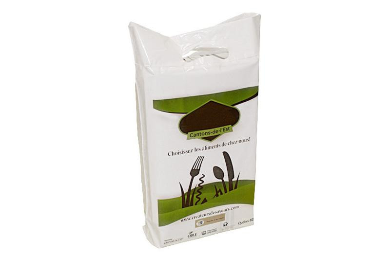 Boutique Bags – a white plastic food delivery bag with a cutout handle, green accents, and printed utensils on the front.