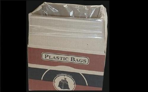 A cardboard box labeled "PLASTIC BAGS" contains a stack of clear plastic bags, with one partially pulled out from the top.