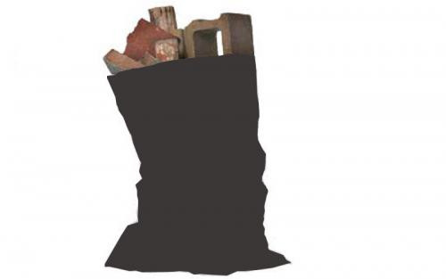 A black garbage bag filled with bricks and broken concrete pieces.