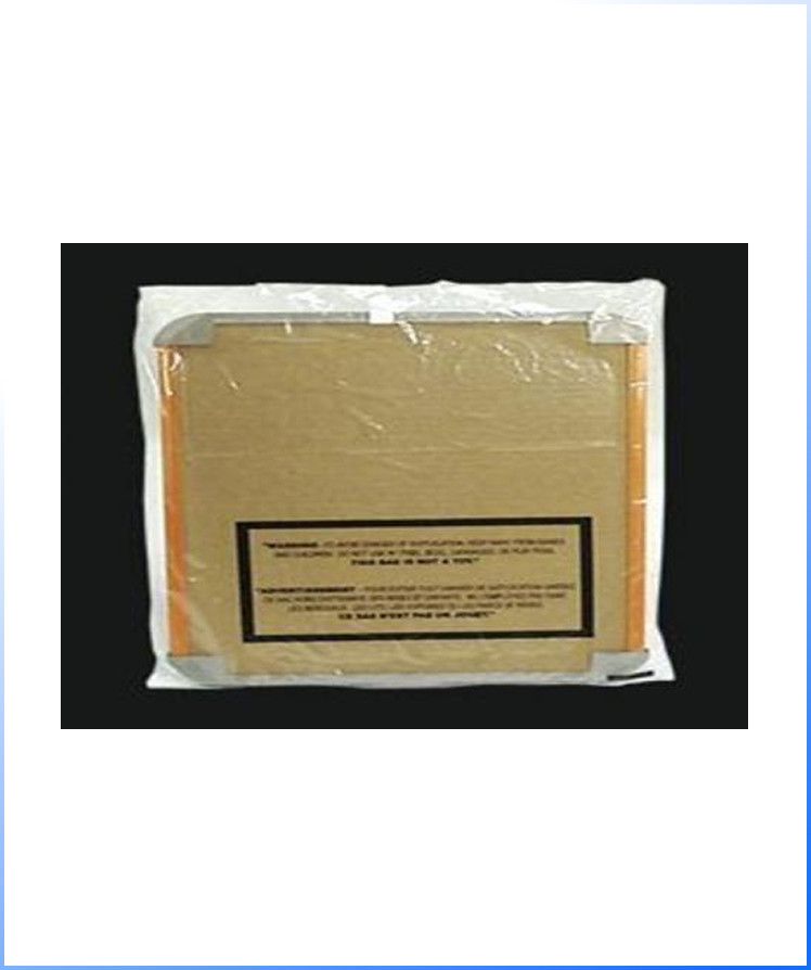 A cardboard box wrapped in clear plastic and sealed with tape, set against a black background.