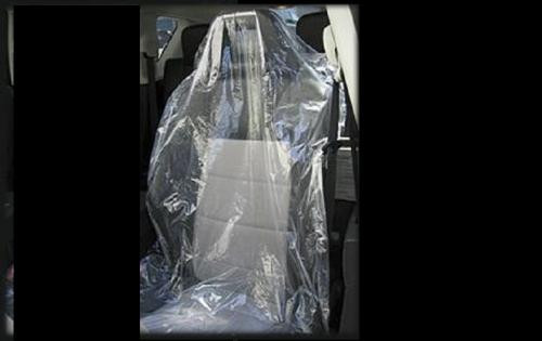 Car Seat Covers – a car seat covered with a clear plastic protective cover.