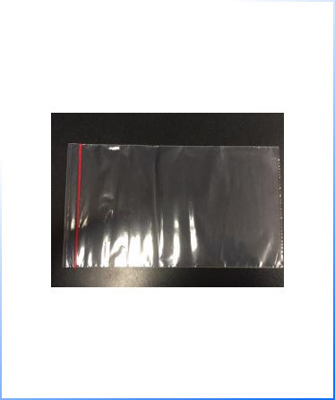 Zipper Bags – a transparent, empty plastic ziplock bag with a red seal strip is shown on a dark surface.